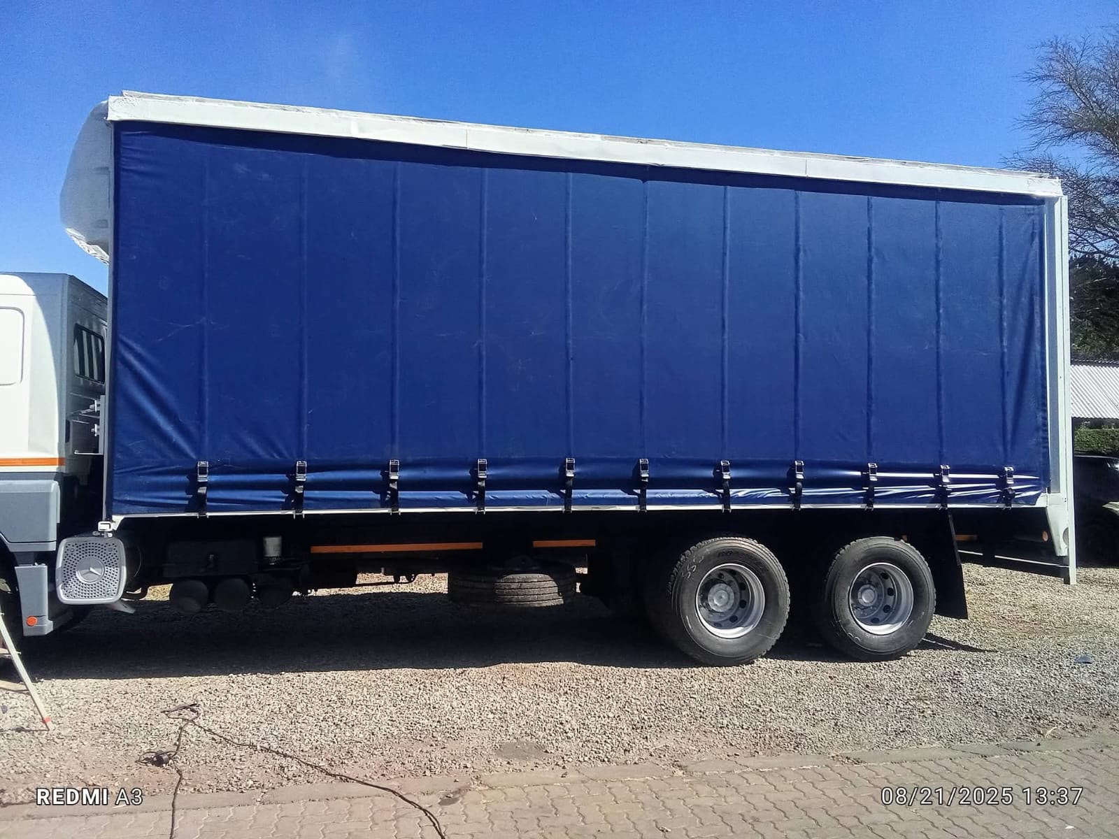 Blue PVC tautliner curtain fitted to a rigid truck in Gauteng